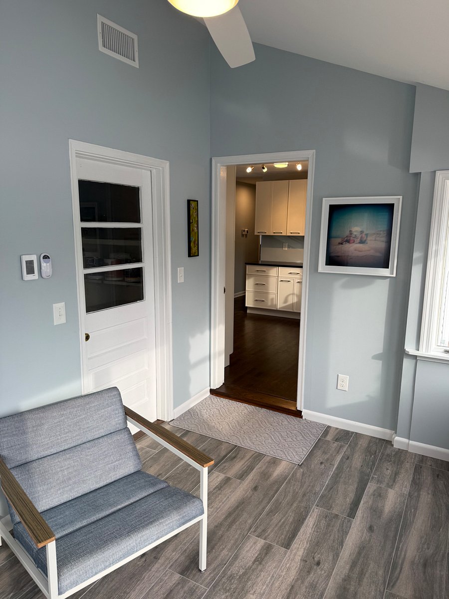 Cozy, four season room off kitchen with marsh and yard views.