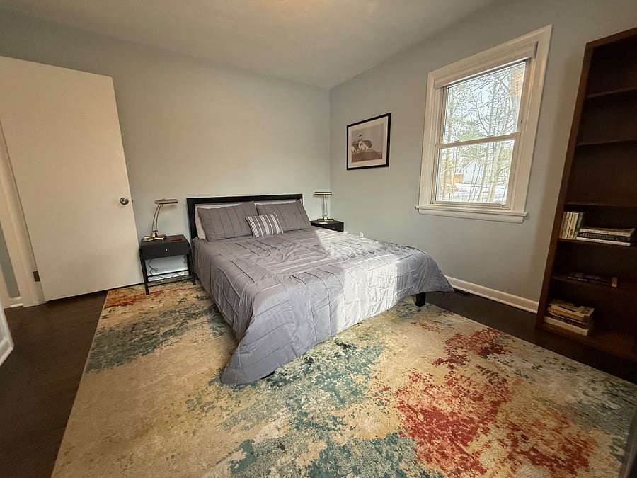 Second bedroom with queen size bed and double closet.