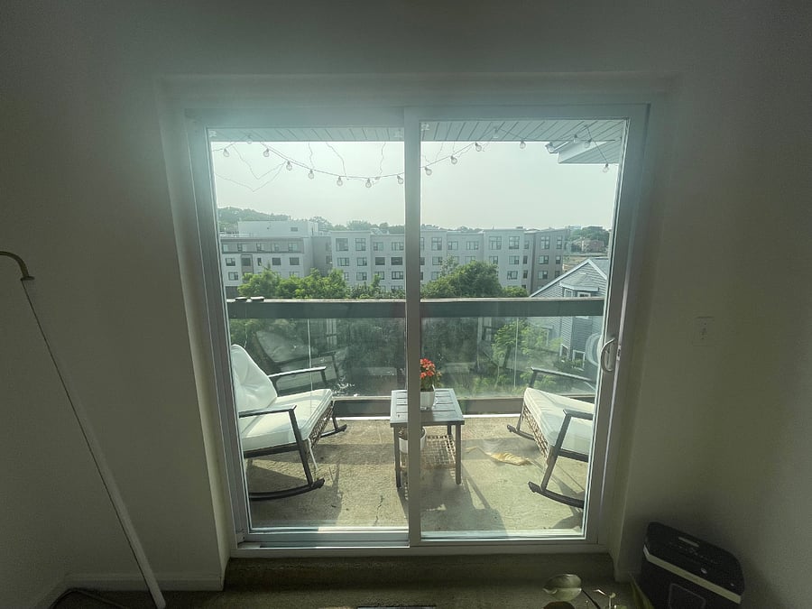 Smaller bedroom has a deck attached to it