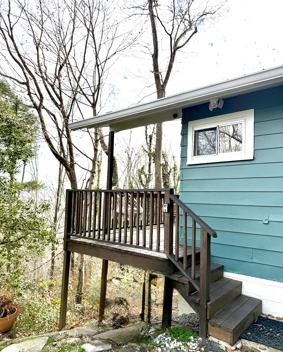 Entrance to home via front covered deck 