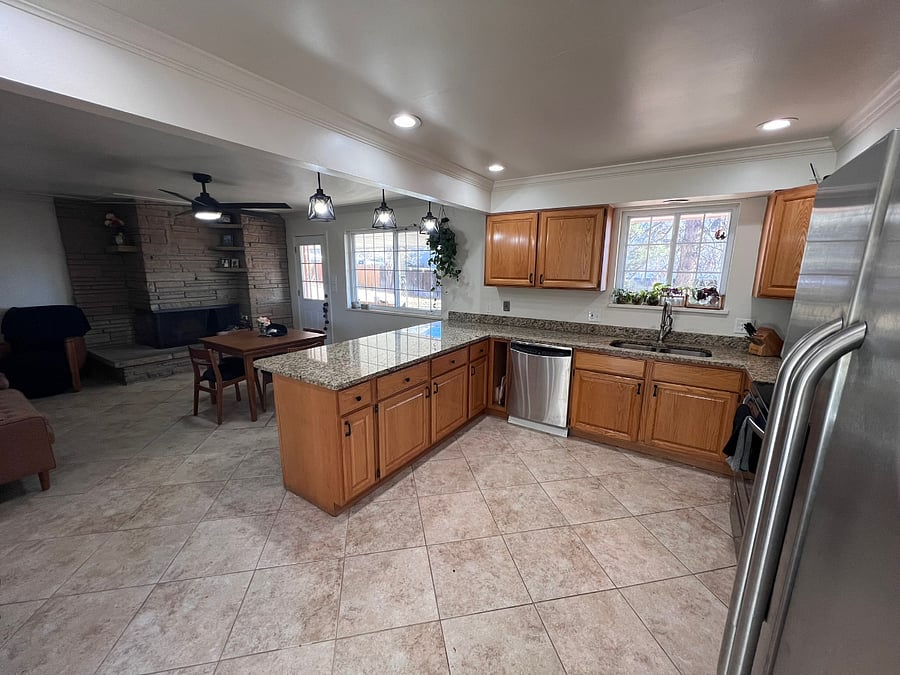 Kitchen has shared amenities (microwave, stove/oven, full fridge, air fryer, toaster, pots/pans), but you will have a dedicated kitchen cabinet with plates, bowls, and cups.