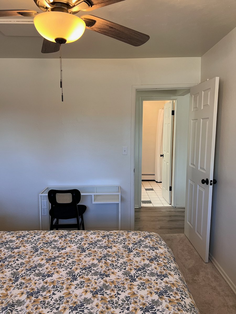 Private bathroom is directly across the hall from the bedroom.