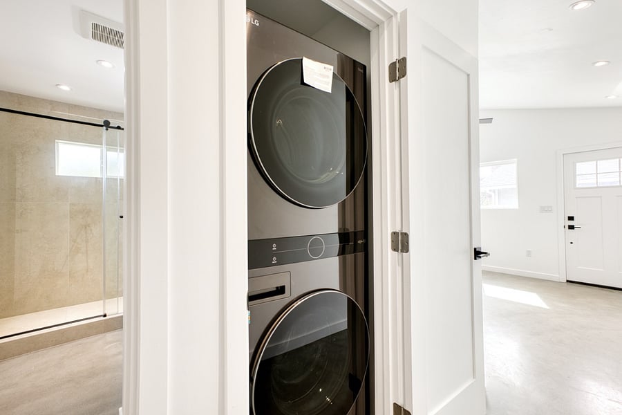 Full size stacked washer and dryer.