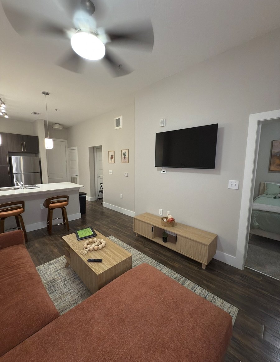 Coffee table has retractable pop up desk