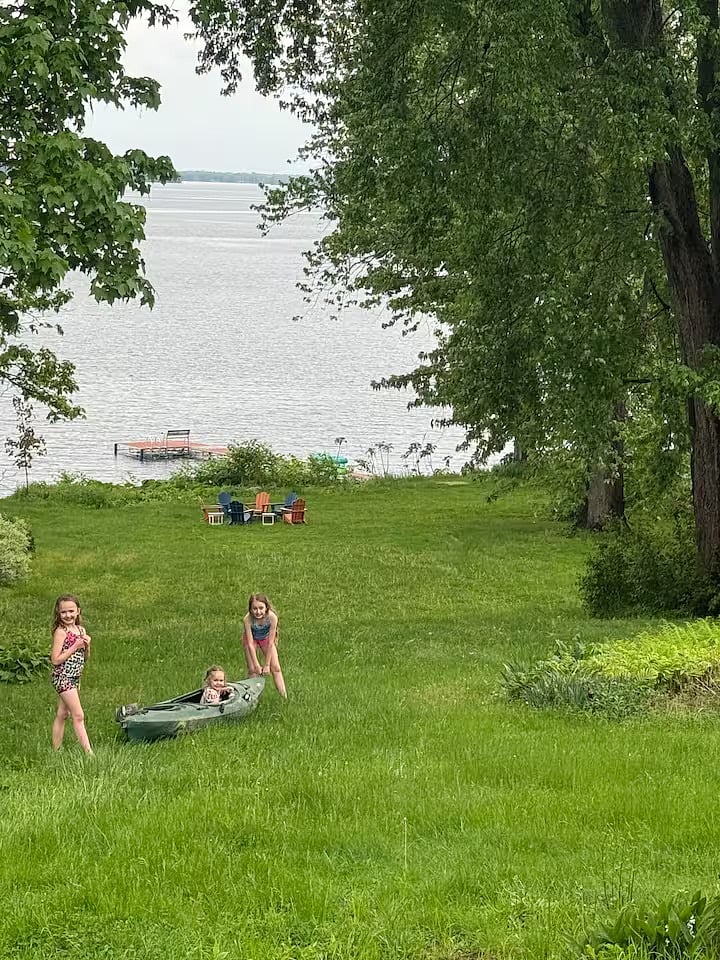 Large backyard with plenty of space for the kids to play. Great views of the lake and backyard from the back porch.