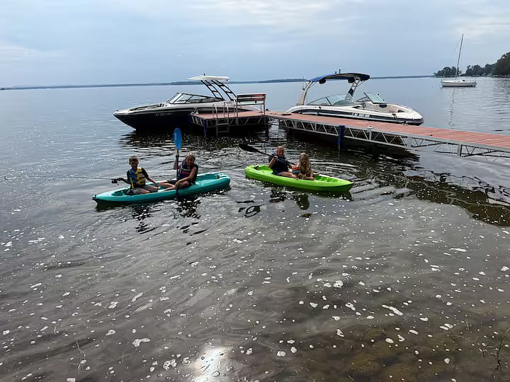 Sandy bottom that is approximately 4' deep. Easy boat access from Oneida lake with no hazards in front of the dock. Straight shot out to the lake. Two 24' boats shown docked for scale.