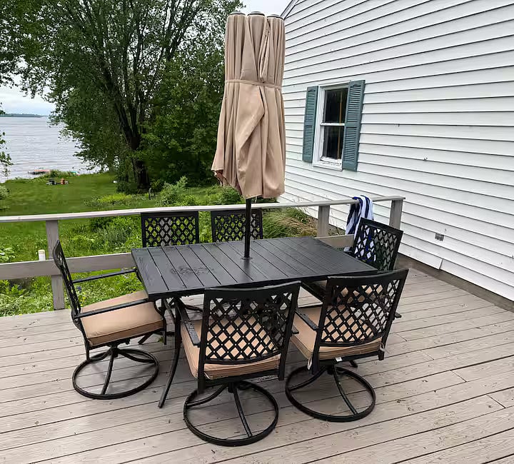 Backyard patio set overlooking the lake. Great for grilling with the included BBQ grill.