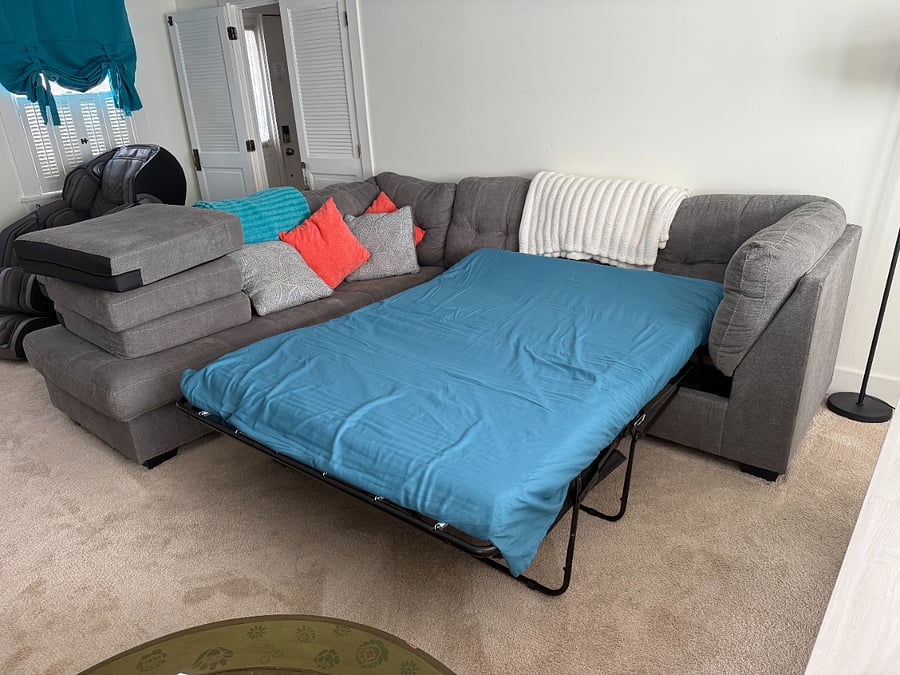 Livingroom can be converted into a 4th bedroom with doors that close the space off and a pull out couch.