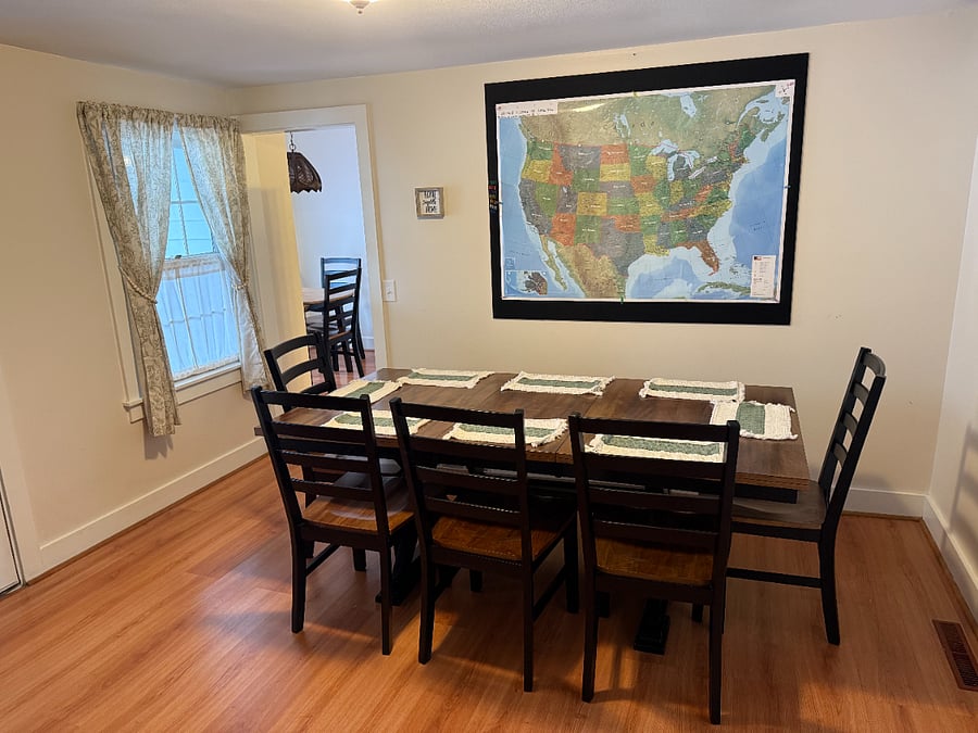 Formal Dining Room with a "Where are you from?" Pin Map. 
