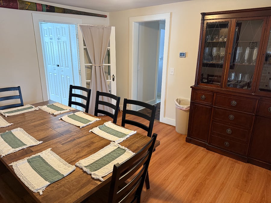 Formal dinning room with seating for 8-10.  Wine glasses, whisky glasses, champagne flutes, beer glasses and wine decanter available for use in the china hutch. 