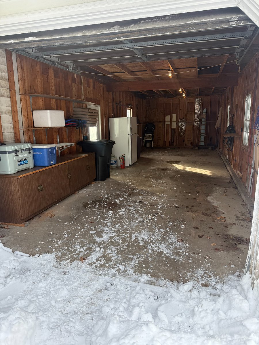 Two car deep garage, which is big enough for a truck and trailer connected.  Additional refrigerator/freezer located in the garage, as well as portable coolers for use.  Big enough for crew cab F350 with 14' trailer connected and room to spare.