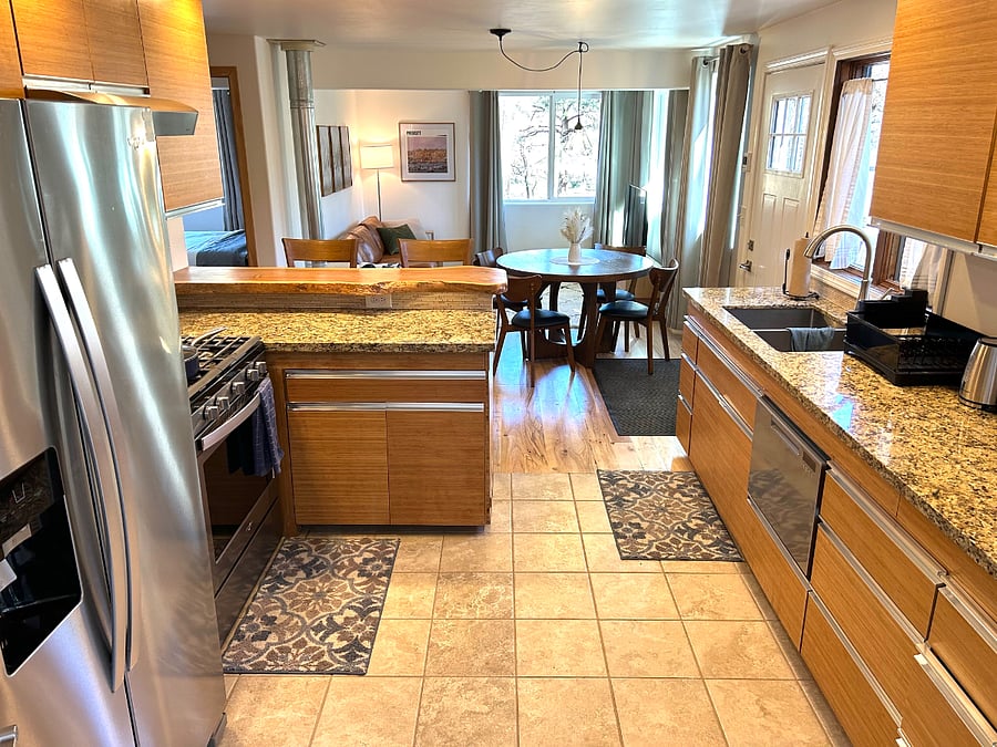 Full-size kitchen open to the living room.