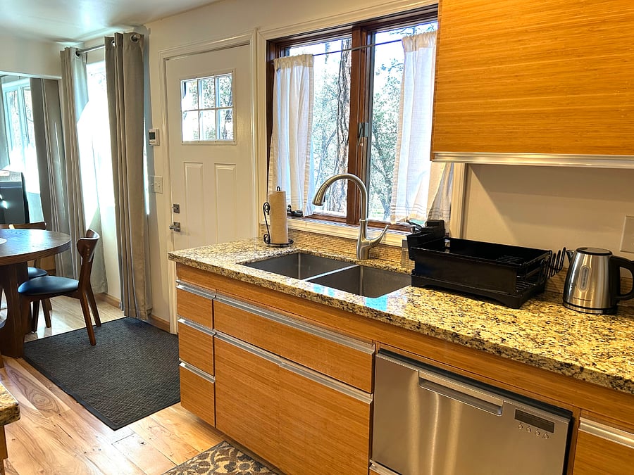 Full-size kitchen open to the living room.