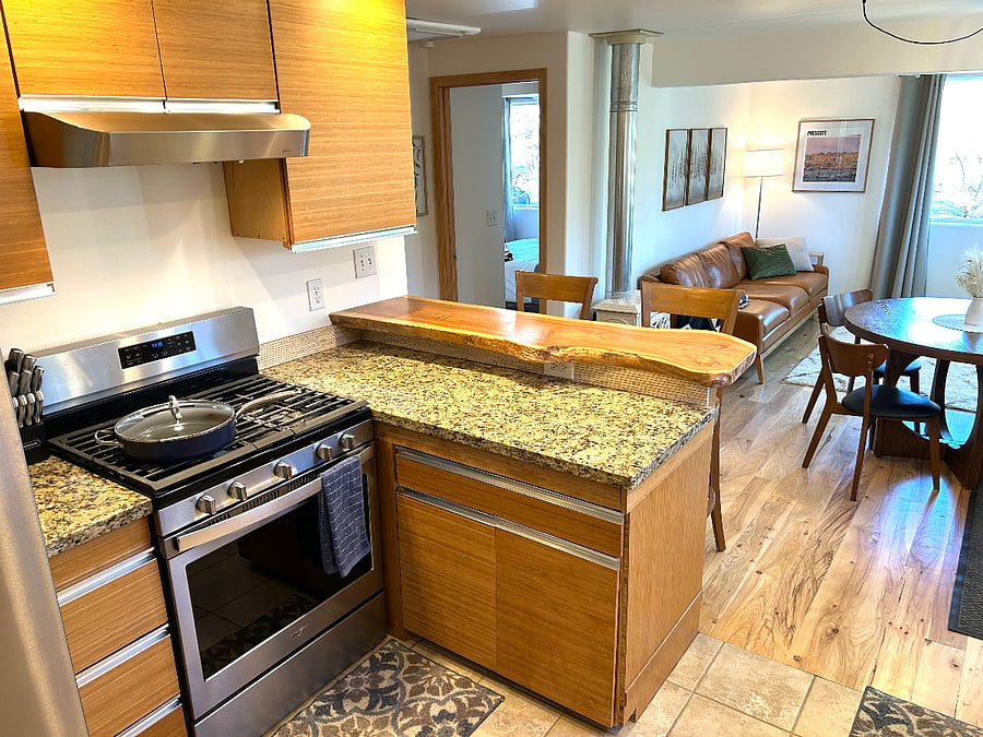 Full-size kitchen open to the living room.
