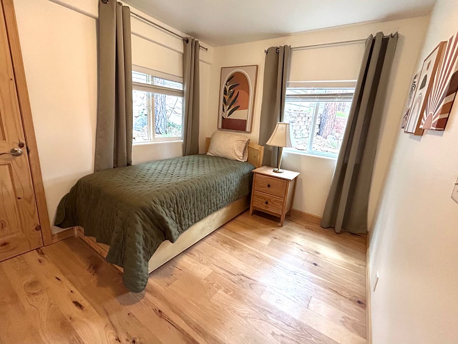 Secondary bedroom with a twin bed and trundle.