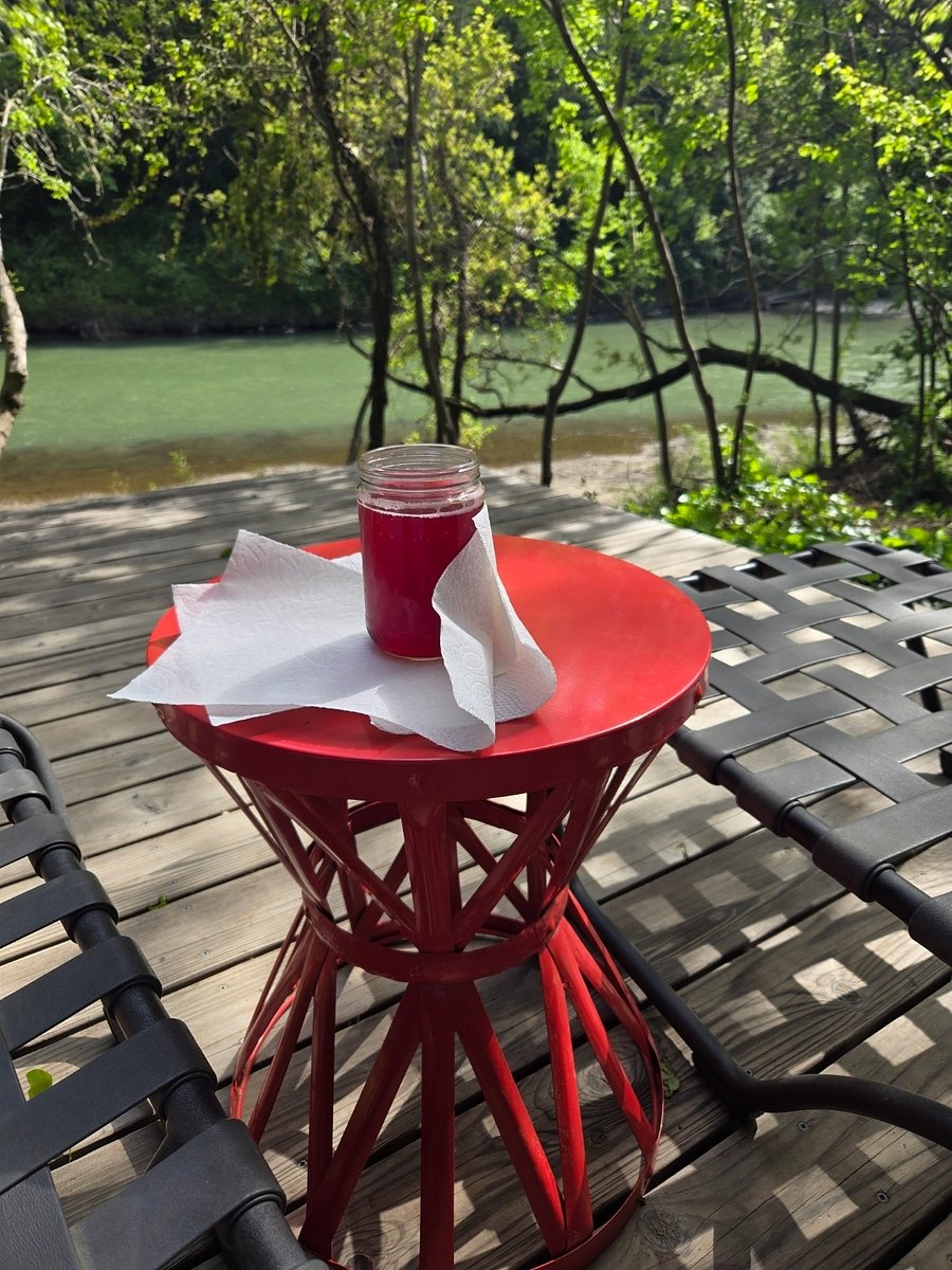 2 minute walk from front door: Lounge chairs on deck overlooking the river