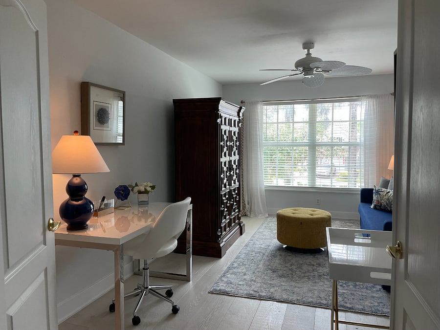 Large Den features a desk area with a printer