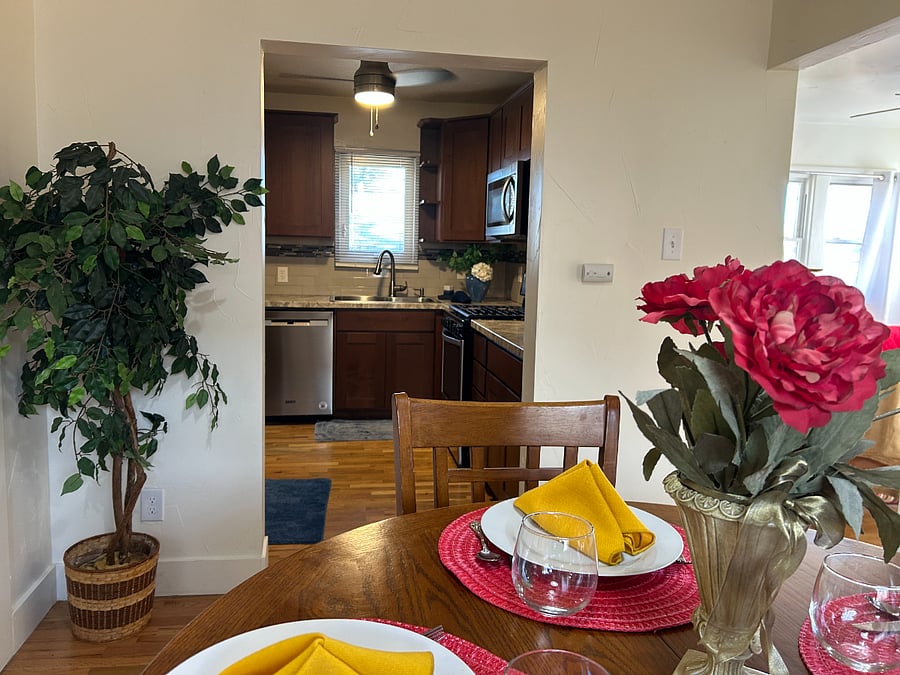 Spacious dining room located between the living room and kitchen