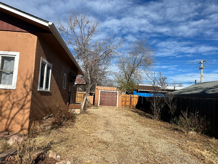 Huge parking area and covered entryway into the kitchen/butler pantry