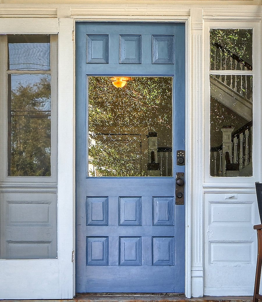 Front door with key pad. Leads to entryway foyer and up steps to Apartment B with another key lock.   