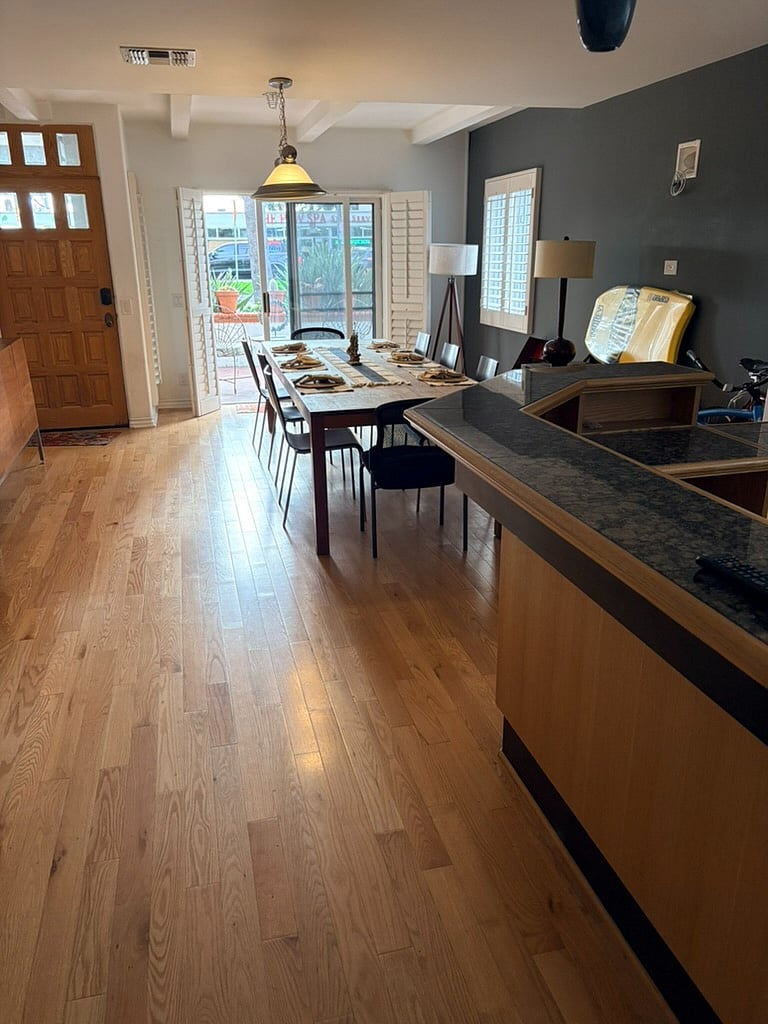 1rst Floor -- Large dining table and bar.