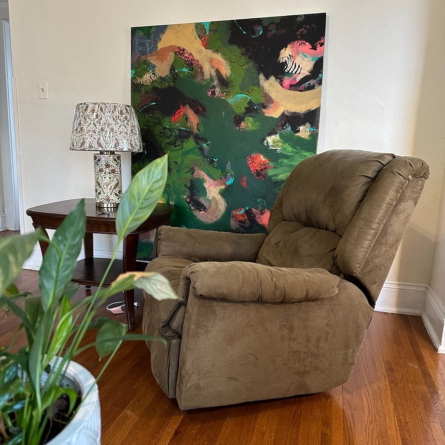 Lazy boy recliner in the living room area for relaxing and TV watching