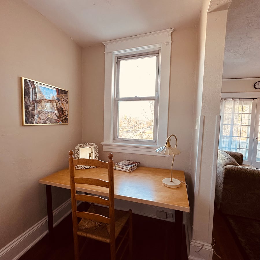 Designated work space in a nice nook of the living room.