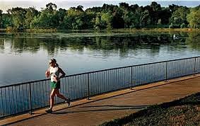 A 13-mile paved trail system connects the chain of five urban lakes.