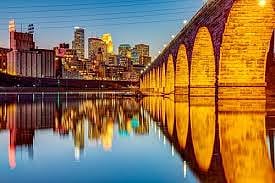 Downtown, the iconic Stone Arch Bridge connects the East and West banks of the Mississippi.