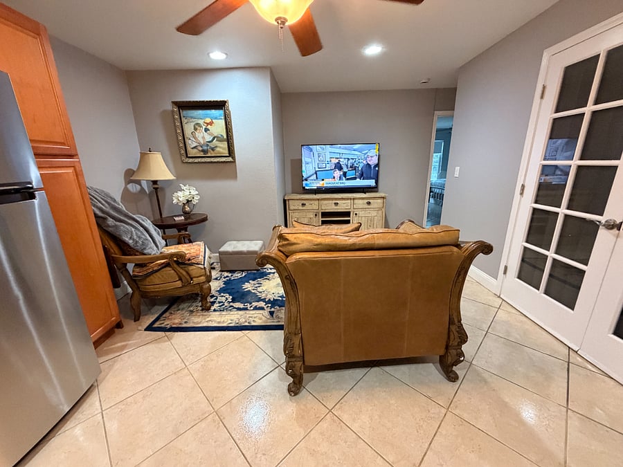 TV sitting area in between both bedrooms.