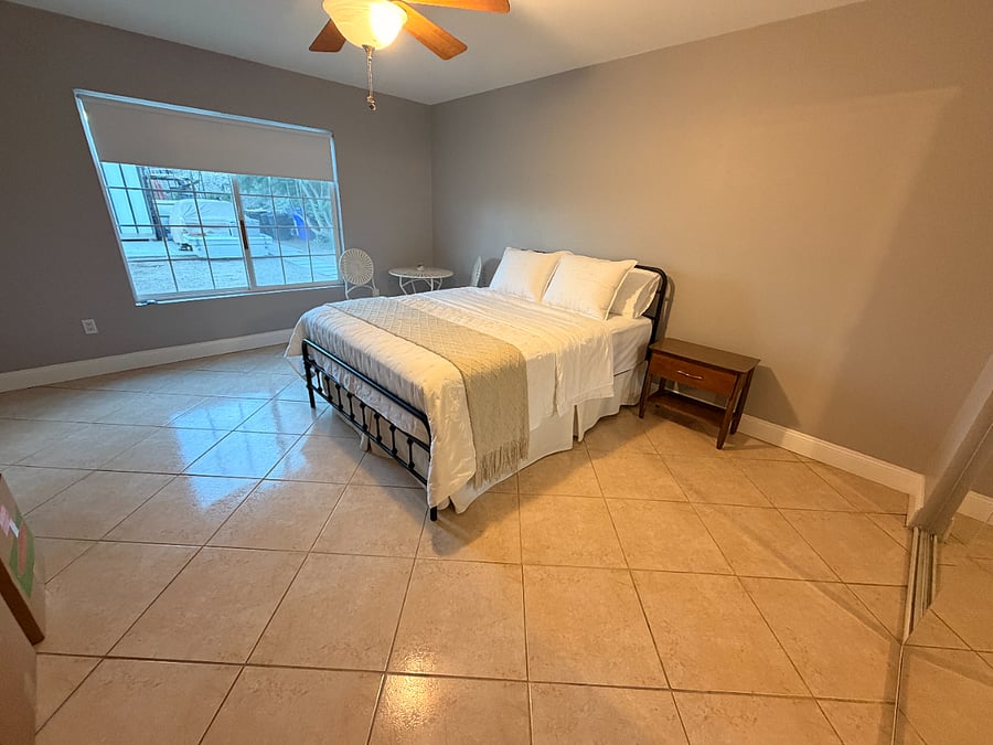 2nd bedroom (large) with view to backyard