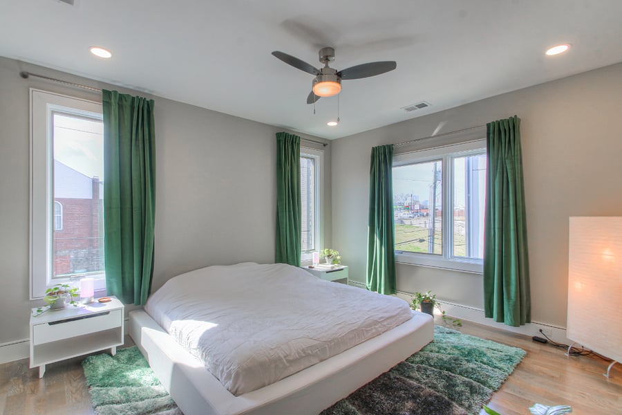 You will L O V E this 3rd floor Jungle Bedroom! The suite features plush, squishy carpet, velvet curtains, Mid-Century-Modern finishes, & views of Downtown Nashville out the main window!