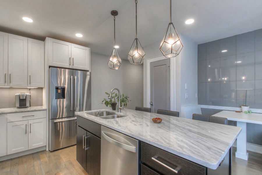 Sit at the oversized kitchen island & watch your favorite TV show while you eat breakfast! :)