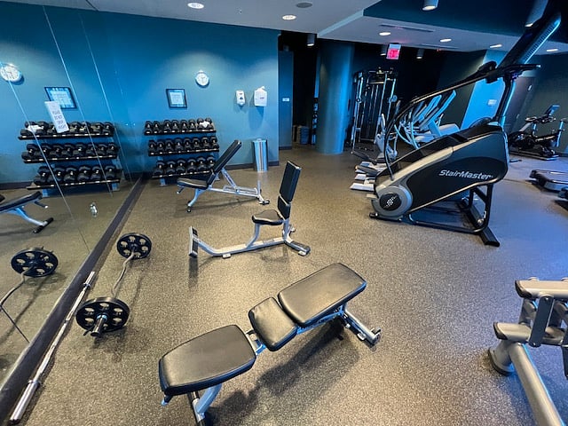 Ten-floor building amenity showing another view of the fitness area.   