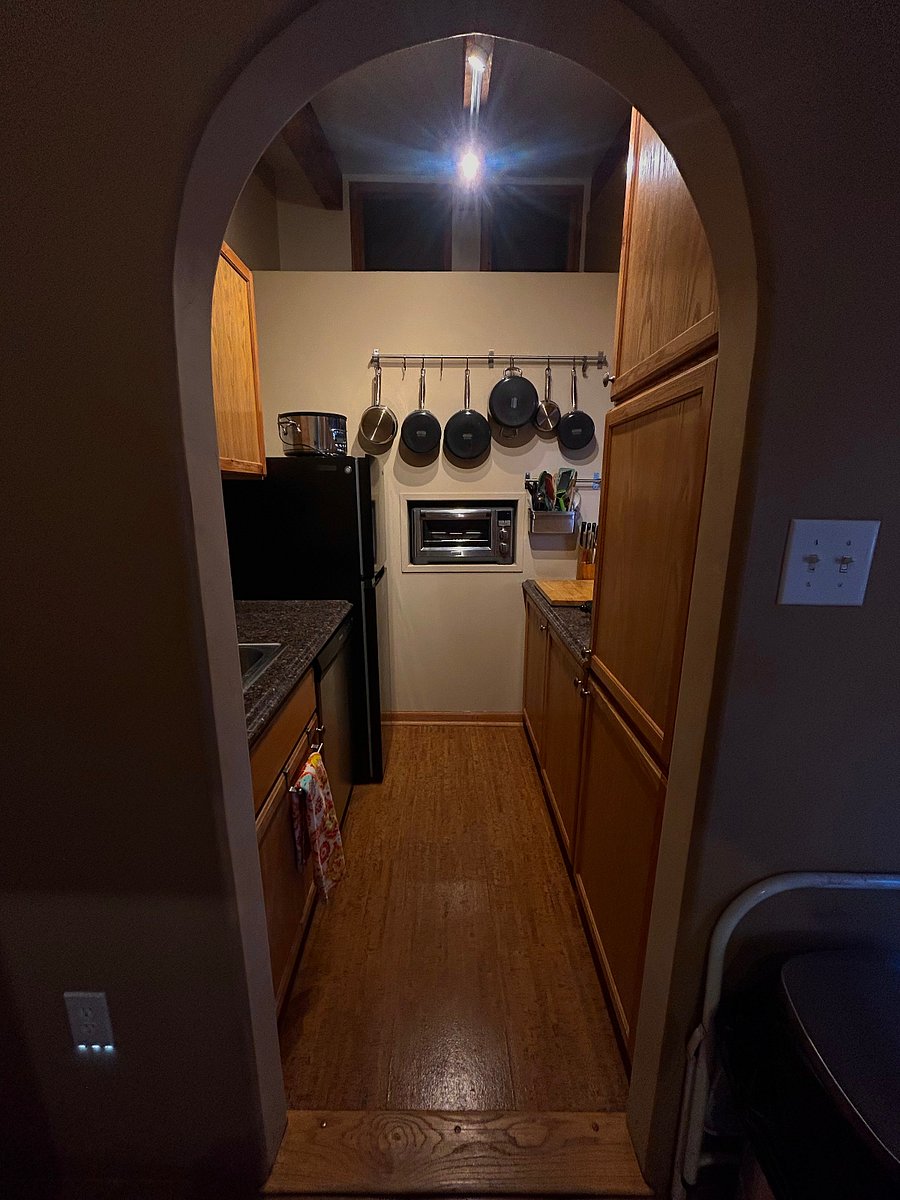 Kitchenette, with refrigerator, sink, dishwasher, microwave, 2-burner hot plate, convection oven.