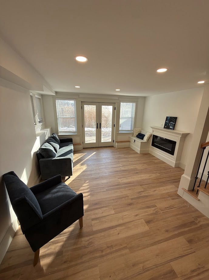 Lower Level Sunny Sitting Area w/Walk Out
