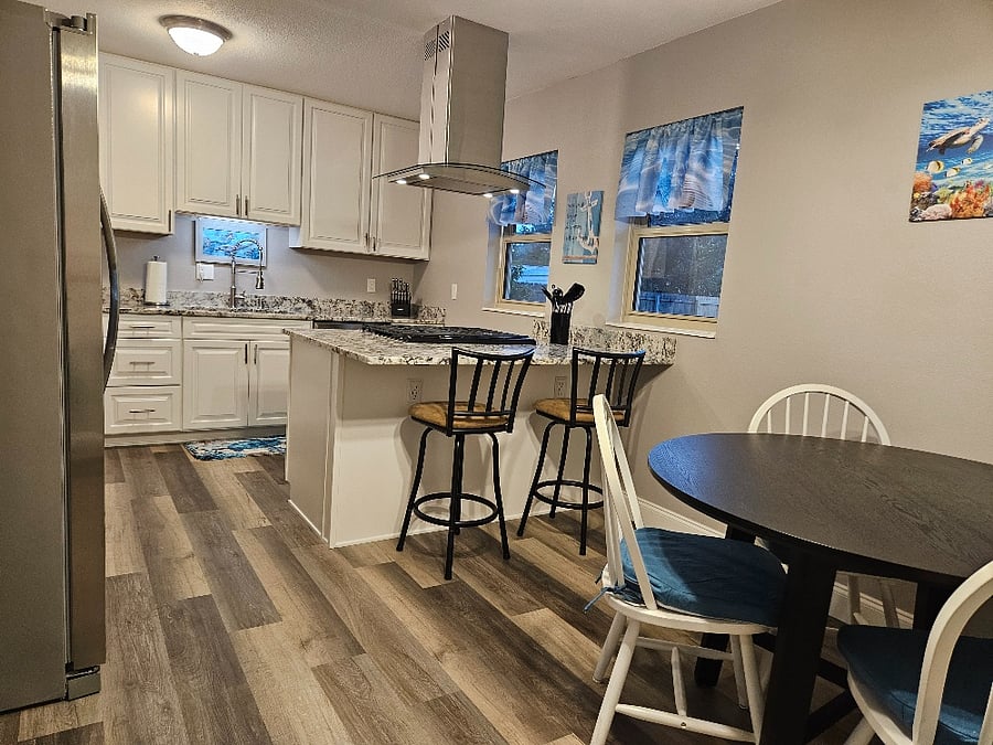 Brand New Cabinets, Granite Countertops, Appliances, Paint, and Flooring.