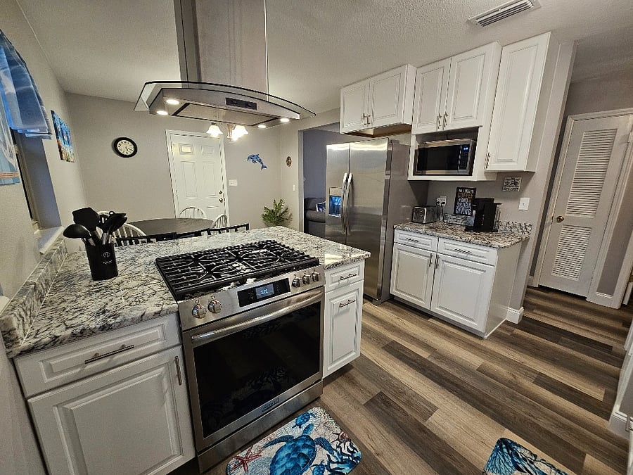 Brand New Cabinets, Granite Countertops, and Appliances