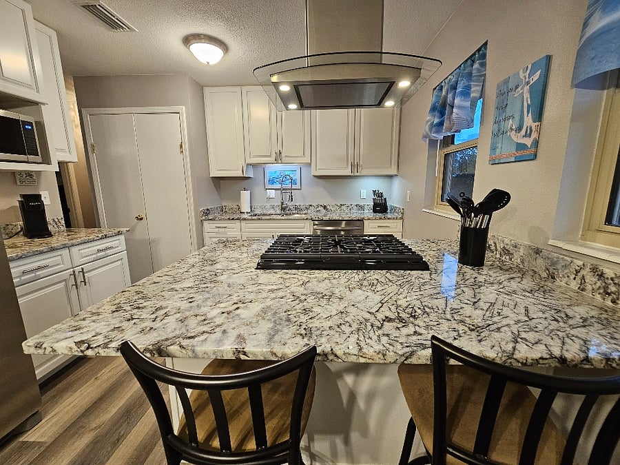 Brand New Cabinets, Granite Countertops, Appliances, Paint, and Flooring.