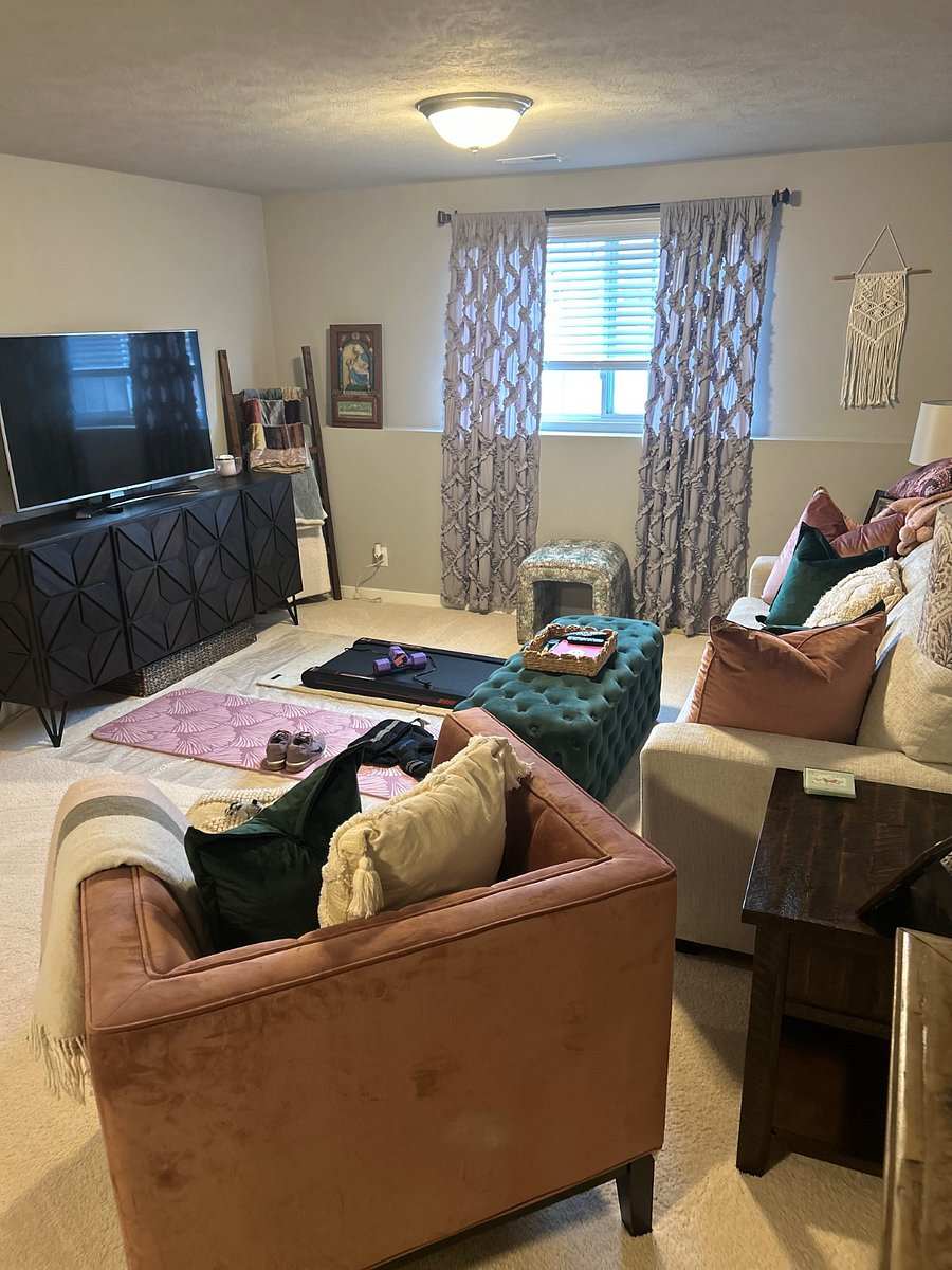 basement living space with full access to workout equipment