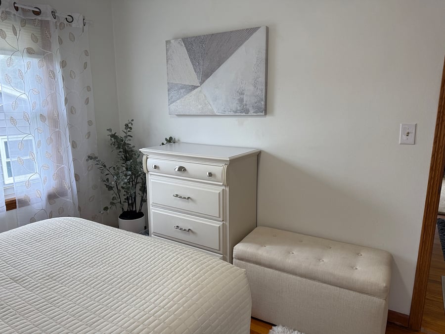 Luxury Queen Size Bed with pillow top mattress and 4 luxury pillows.  Each room contains full size mirror, closet with hangers, chair, bench, dresser, lamp, alarm clock with USB, and ceiling fan.