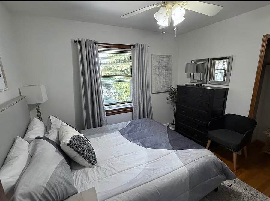 Luxury Queen Size Bed with pillow top mattress and 4 luxury pillows.  Each room contains full size mirror, closet with hangers, chair, bench, dresser, lamps, alarm clock with USB, and ceiling fan.