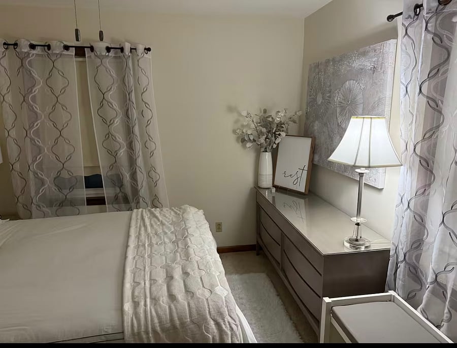 Luxury Queen Size Bed with pillow top mattress and 4 luxury pillows.  Each room contains full size mirror, closet with hangers, chair, bench, dresser, lamps, alarm clock with USB, and ceiling fan.