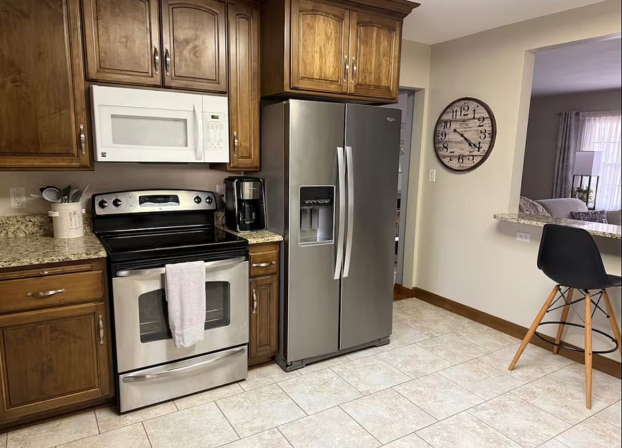 Fully stocked kitchen with all utensils.  Refrigerator, Stove, Microwave, Dishwasher, crockpot, pots, pans, coffee maker, etc.