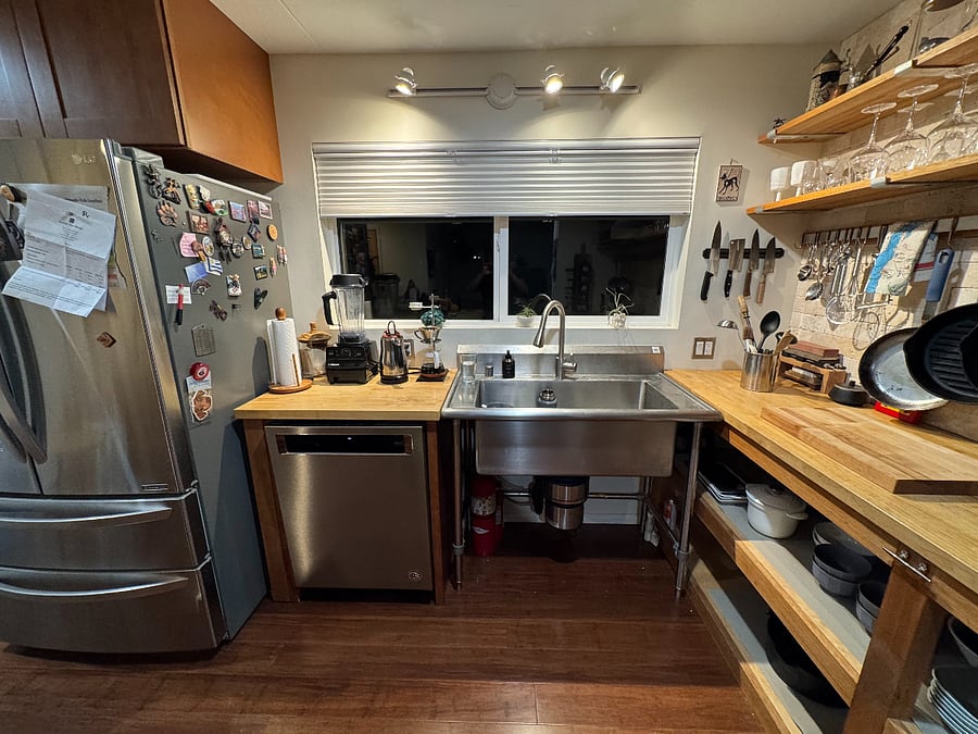 Dishwasher and full-sized refrigerator.