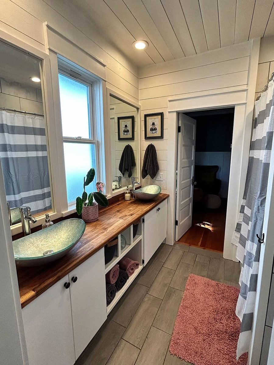 2nd bathroom (full shower/bathtub/toilet/2 sinks); jack and jill doors--one leads to 2nd bedroom and other door opens to sitting room