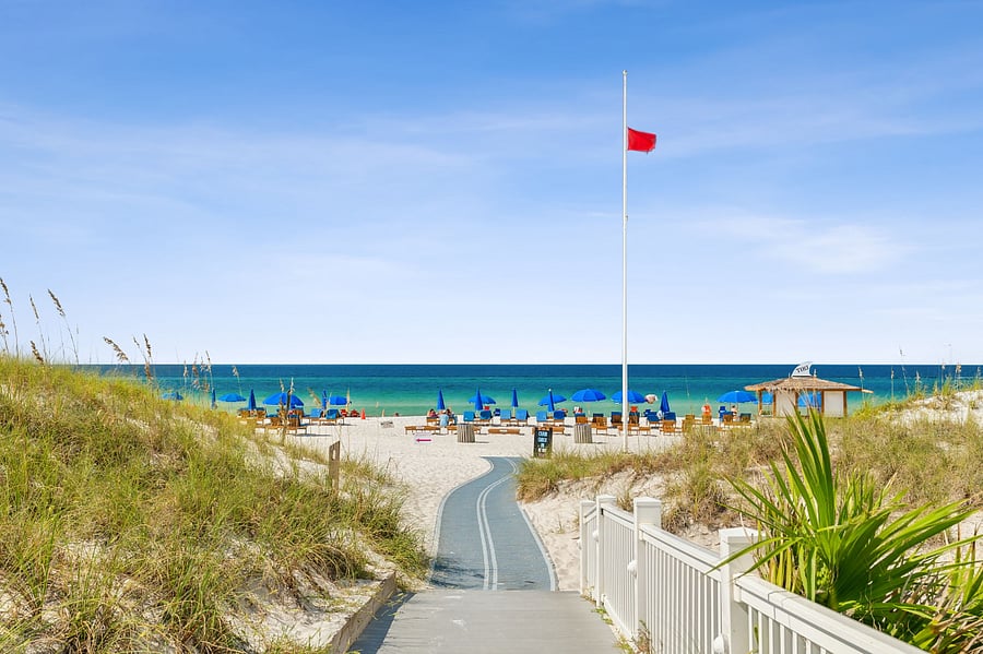 Home is a 5 minute drive to the beach across the street