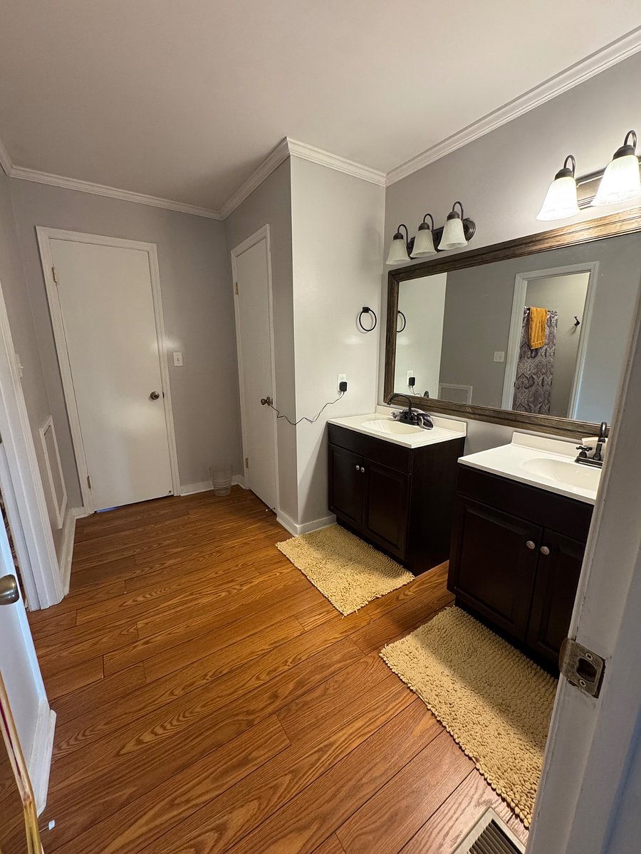 Jack and jill bathroom with 2 storage closets.