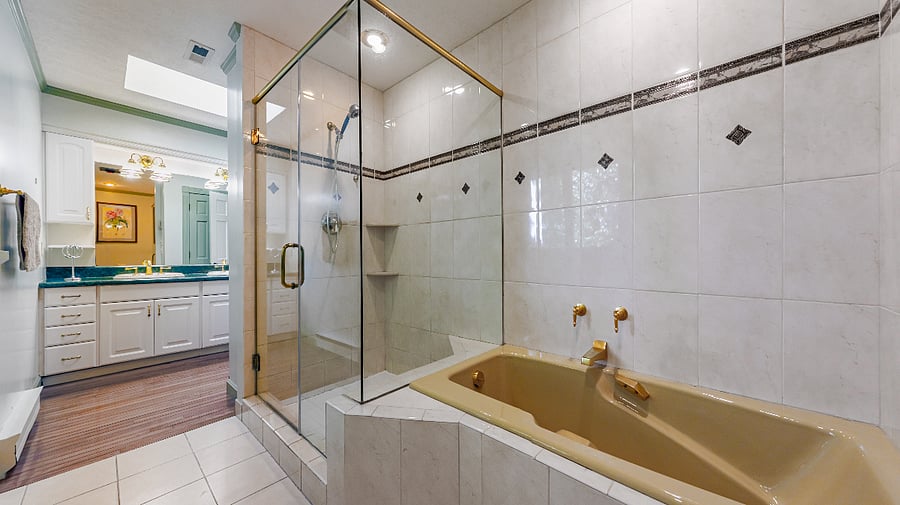 Primary bathroom with soaking tub and walk-in shower