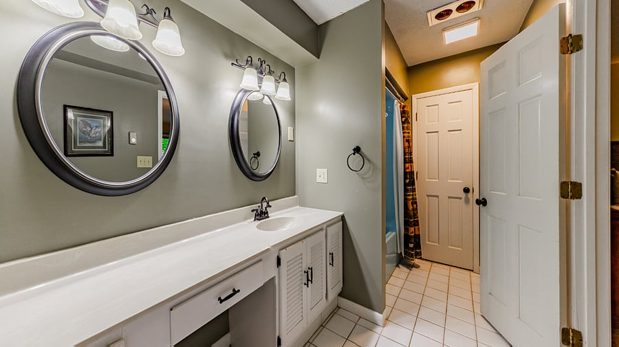 En-suite bathroom adjacent to two-queen bedroom
